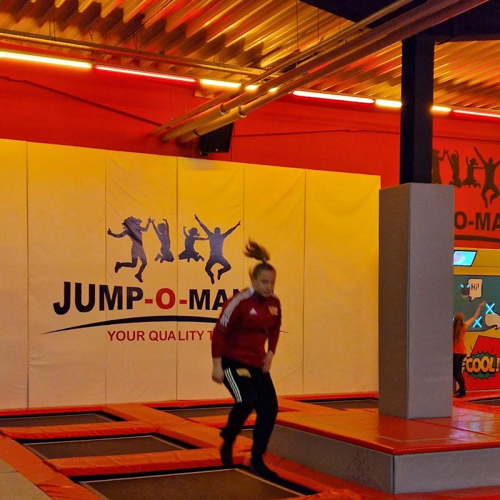 A woman jumping on a trampoline at Jump-O-Mania.